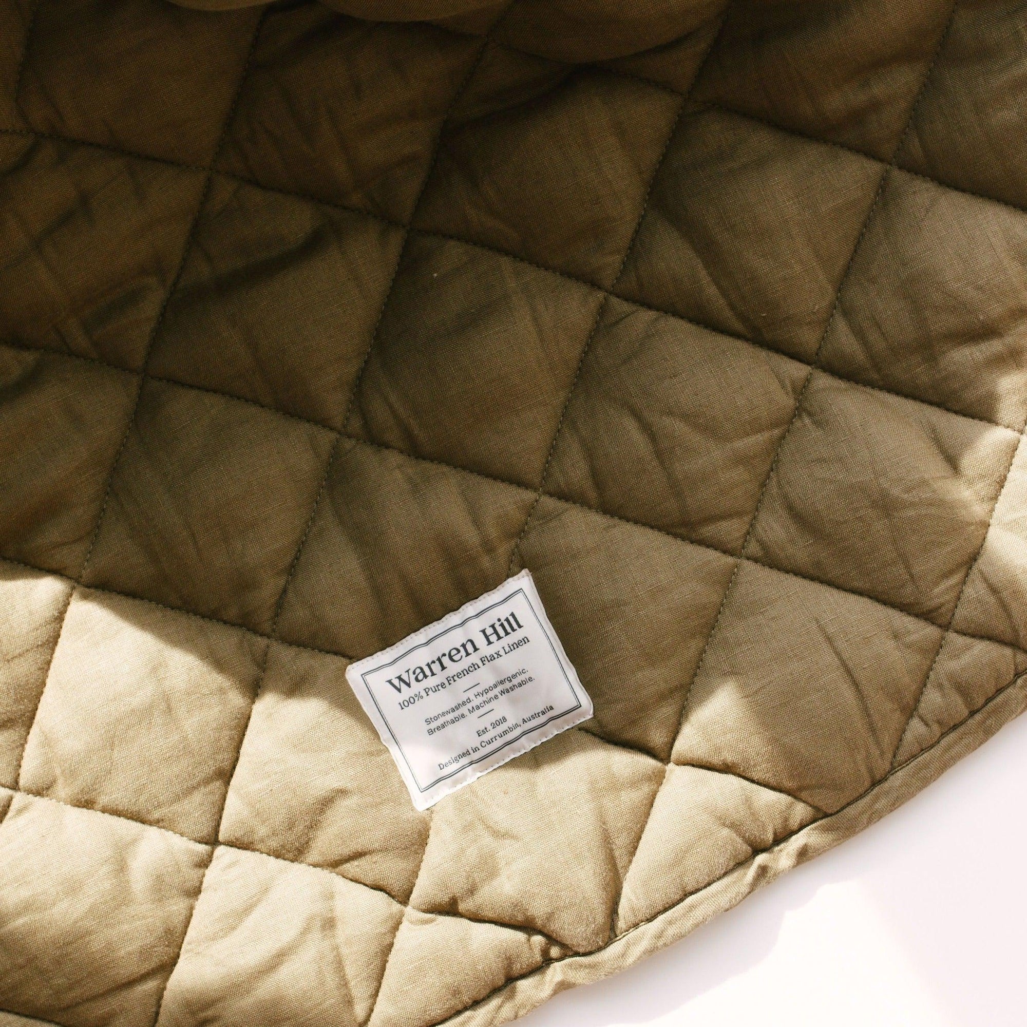 Our Warren Hill baby play mat is made from 100% Pure French Flax Linen with a soft, polyester filling that provides cushion and support for your child's delicate skin. Our linen is stonewashed giving it that beautiful soft, worn-in feel from the first time your child plays on it. Linen is naturally hypoallergenic, extremely durable, and one of the most sustainable materials to harvest and produce in the textile industry.