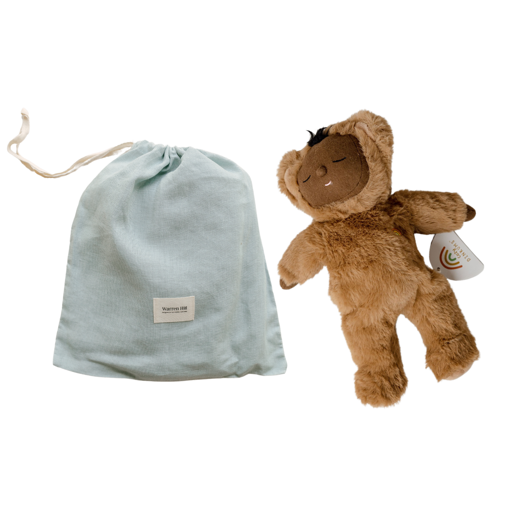 A comforting baby gift, a cozy things gift set from biglittlethings with a blue bag next to it.
