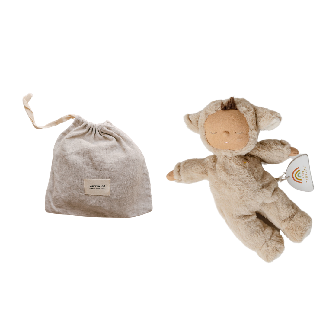 A comforting cozy things gift set with a bag next to it, perfect for baby by biglittlethings.