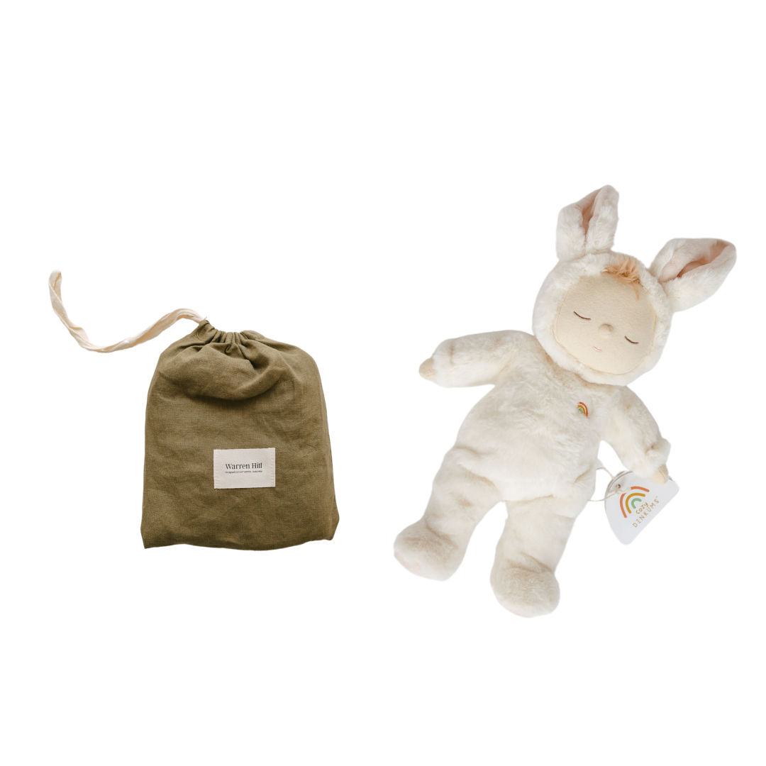 A comforting Cozy Things gift set from BigLittleThings featuring a stuffed bunny with a bag next to it.
