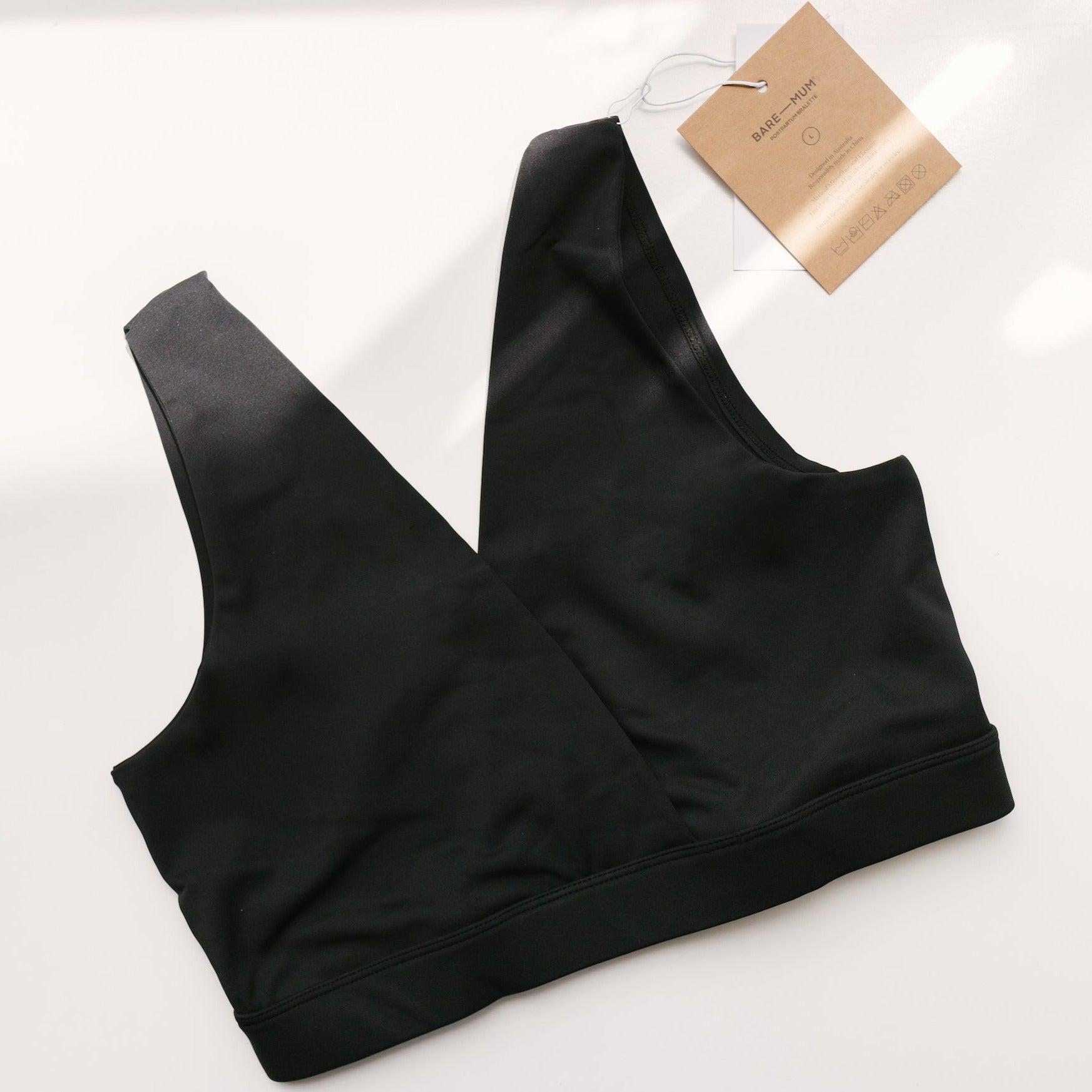 A black Postpartum Bralette with a breastfeeding tag on it from Bare Mum.