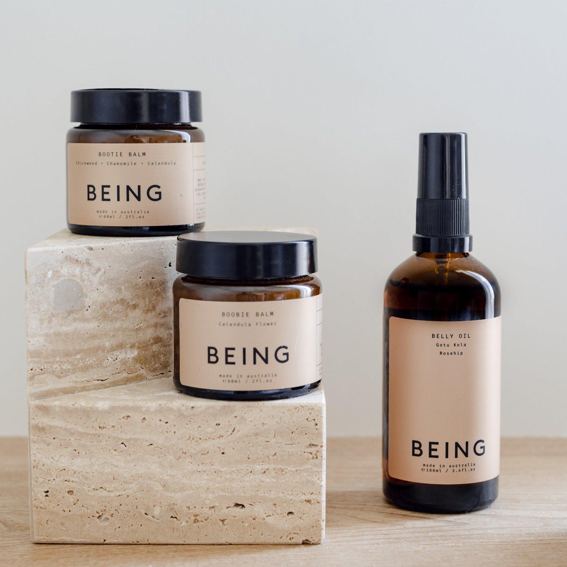 A selection of Being Skincare products lined up.