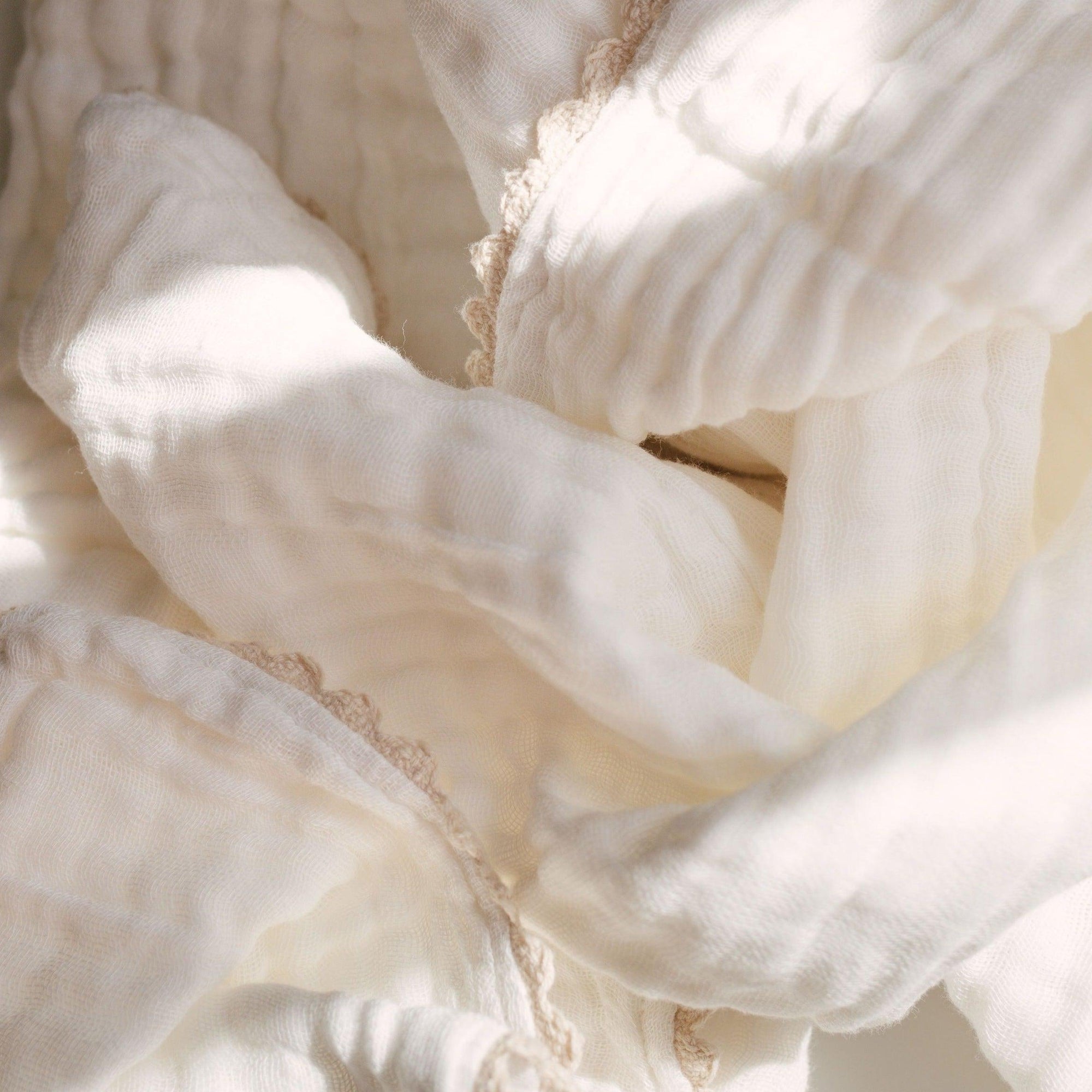 Close up image of the Bundl 100% organic gauze blanket.