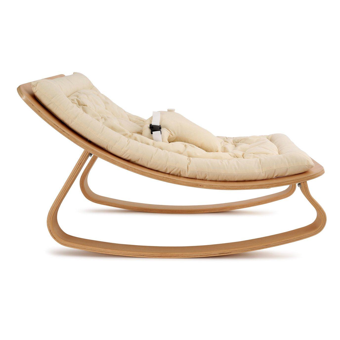A wooden Levo Rocker by Charlie Crane with a white background.