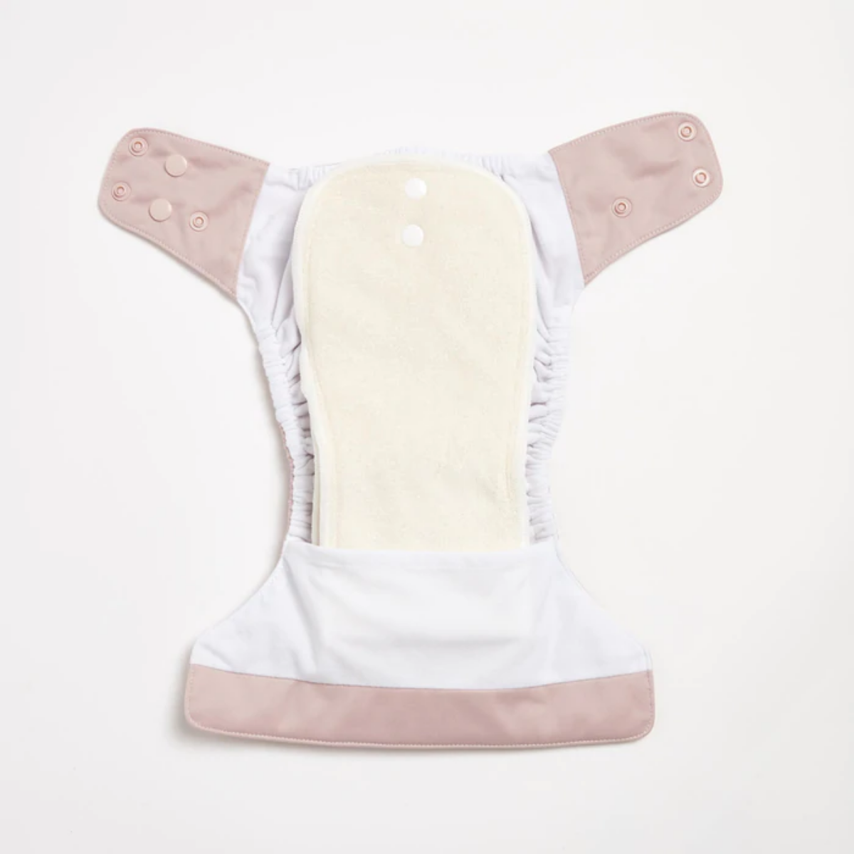 An open Dusty Rose 2.0 Modern Cloth Nappy by EcoNaps on a white surface.