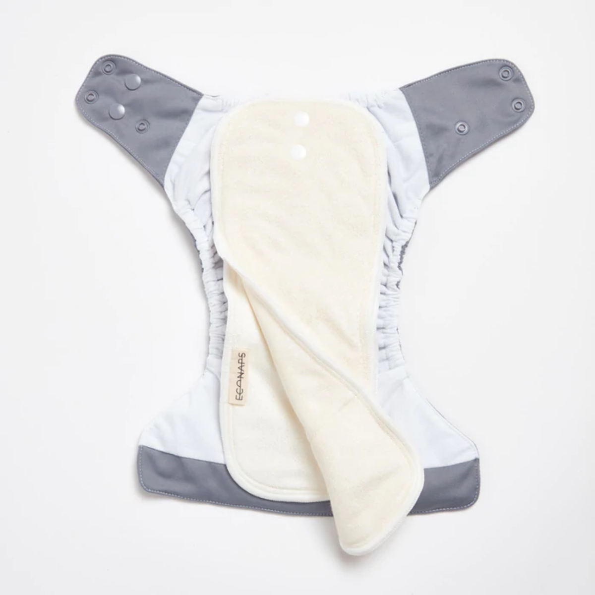 An open Midnight Blue 2.0 Modern Cloth Nappy by EcoNaps on a white surface.