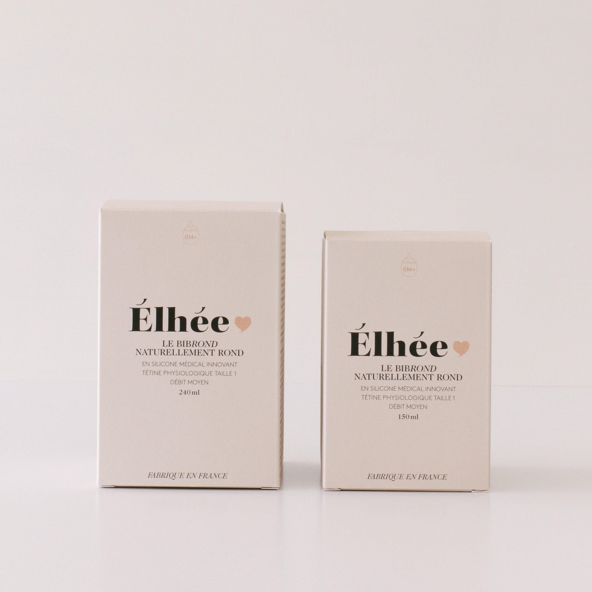 Two boxes of Elhée France Bibrond bottles on a white surface.