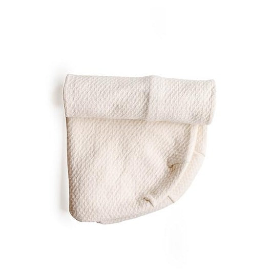 An image of Snuggle Me Organic Puddle Pad on a white surface.